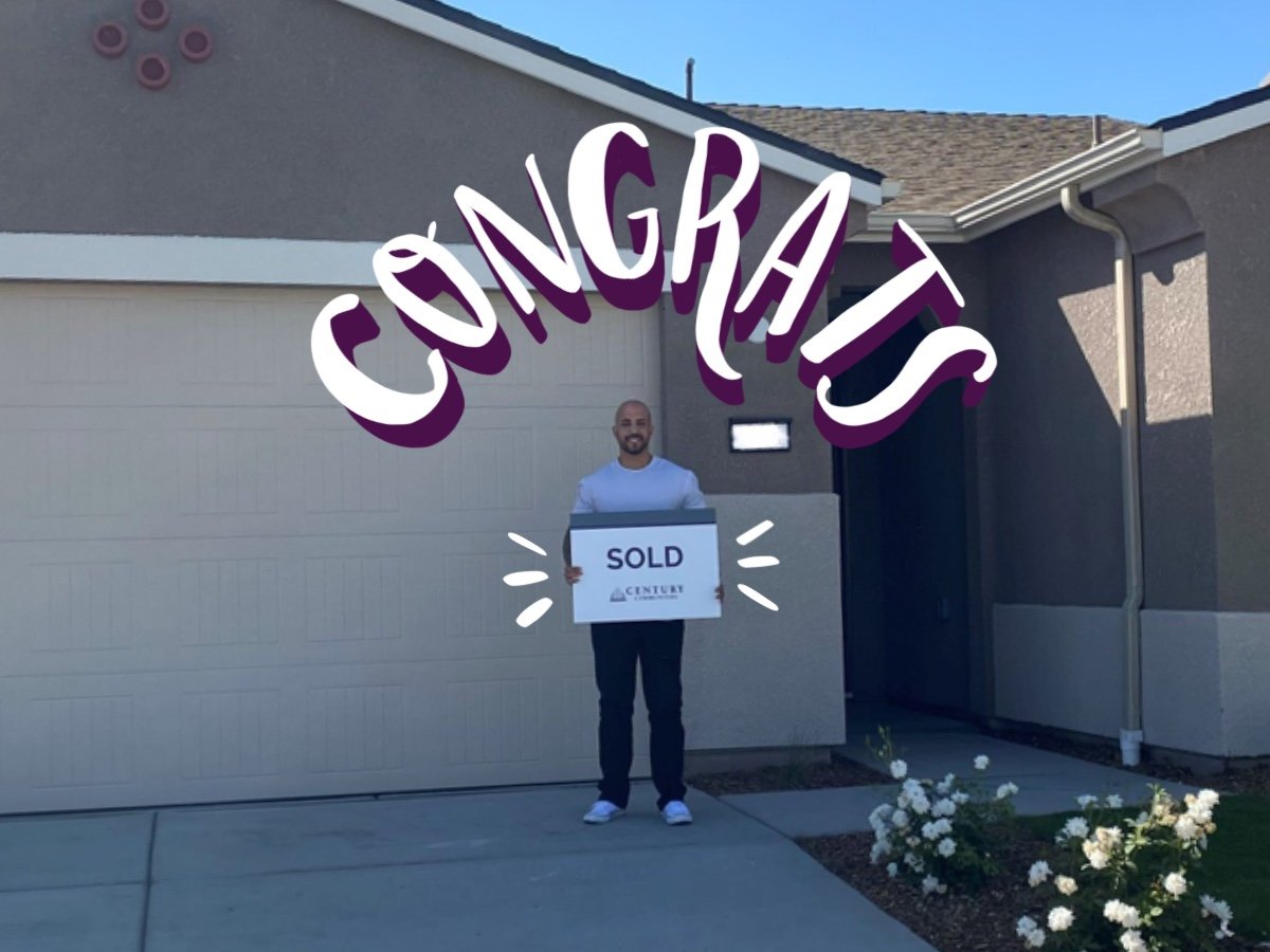 Happy Homeowner - Congrats! A person holding a sign.
