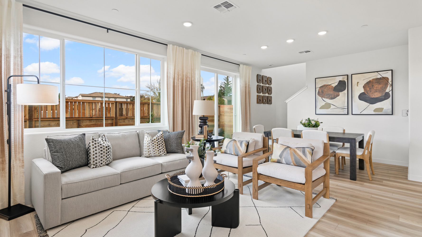 A living room with a large window.