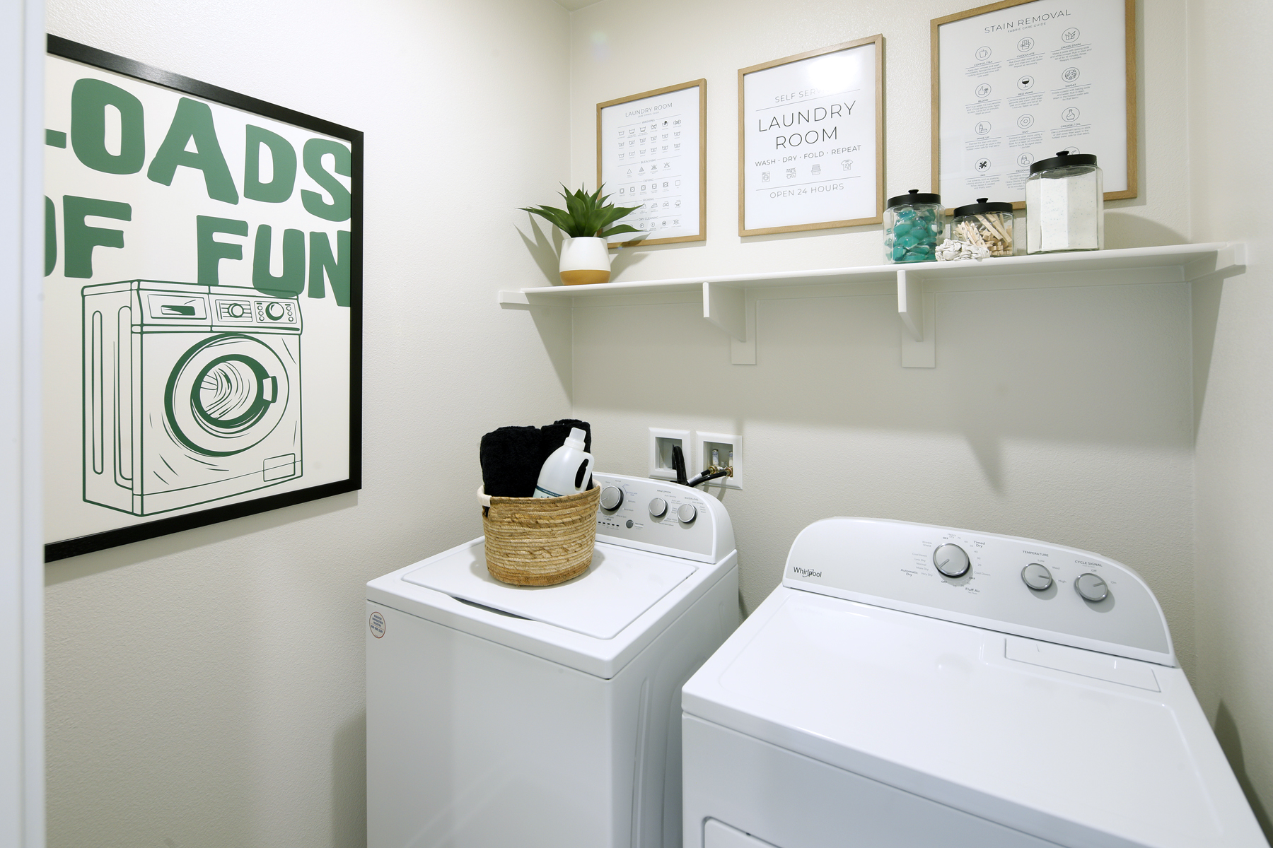A laundry room with a washer and dryer.