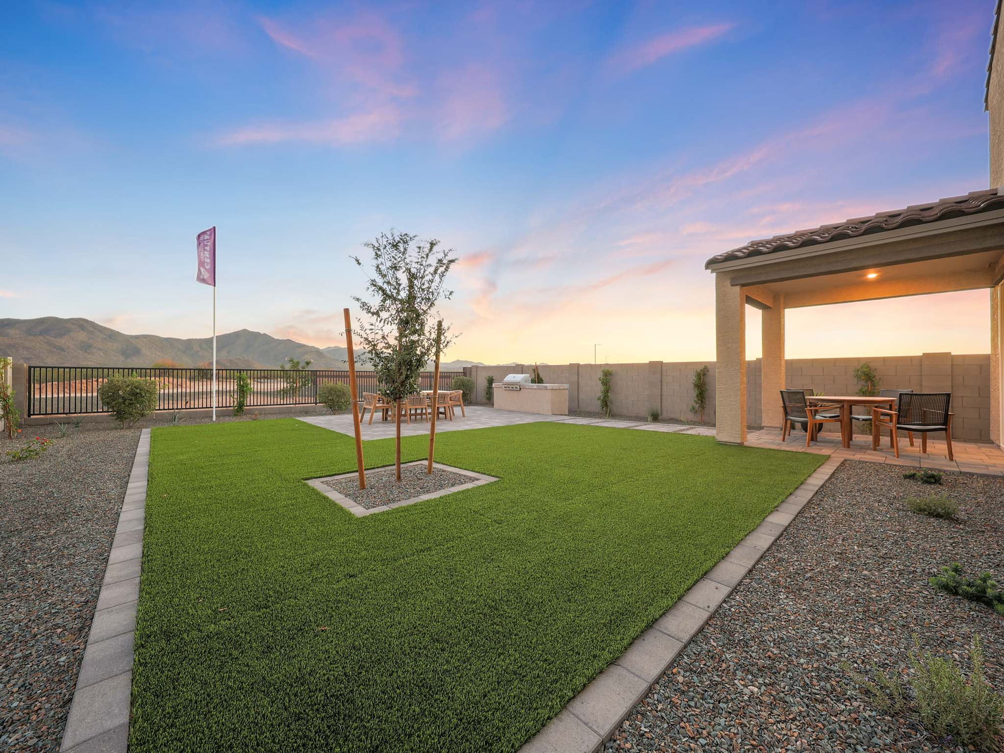 A building with a grass yard.