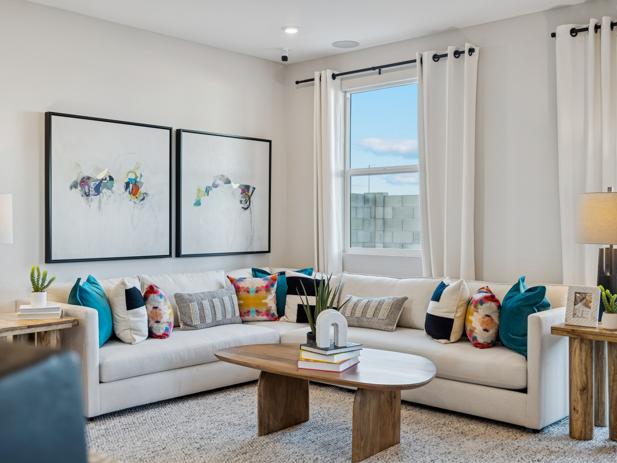 A living room with a couch and a coffee table.