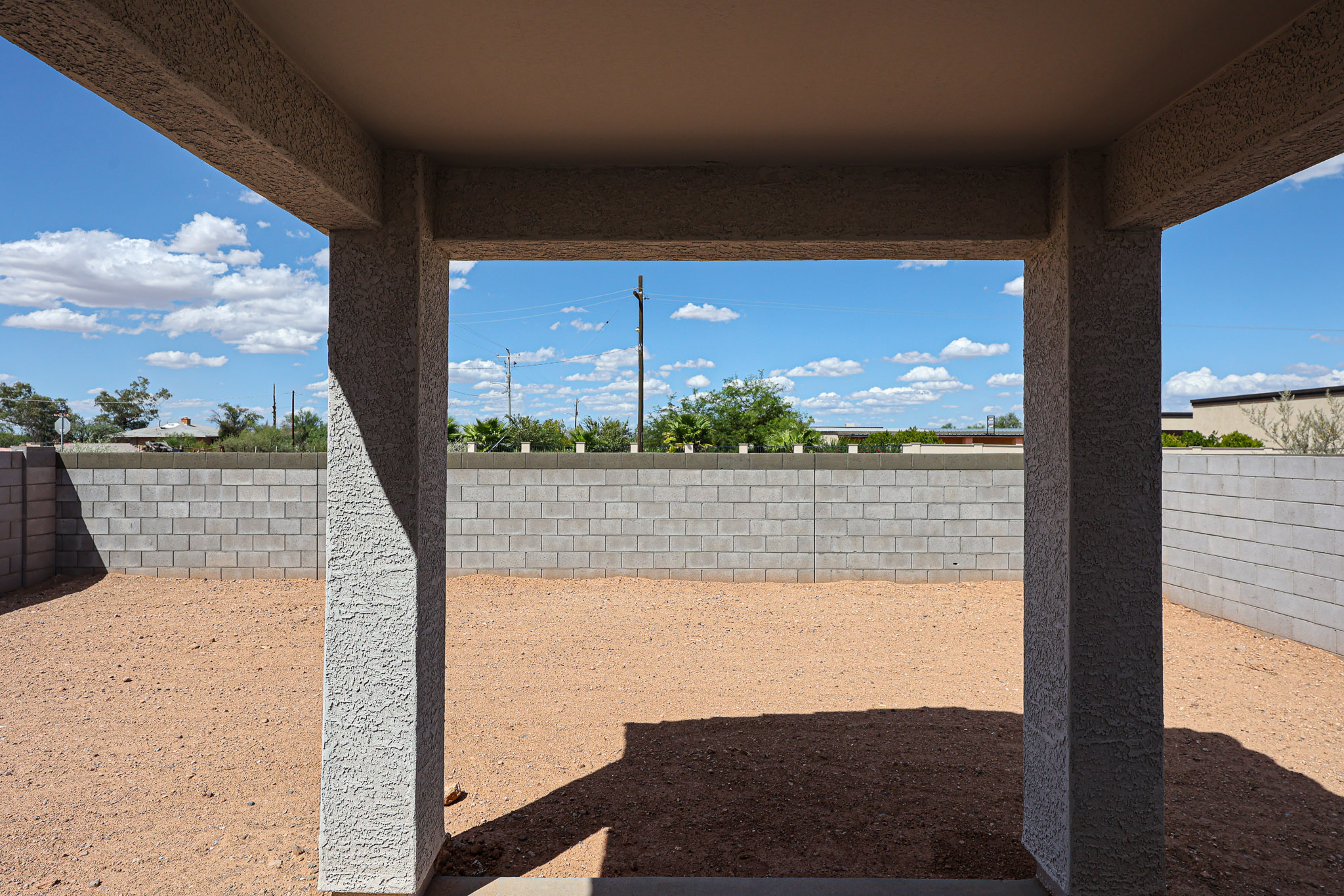 A concrete structure with pillars.