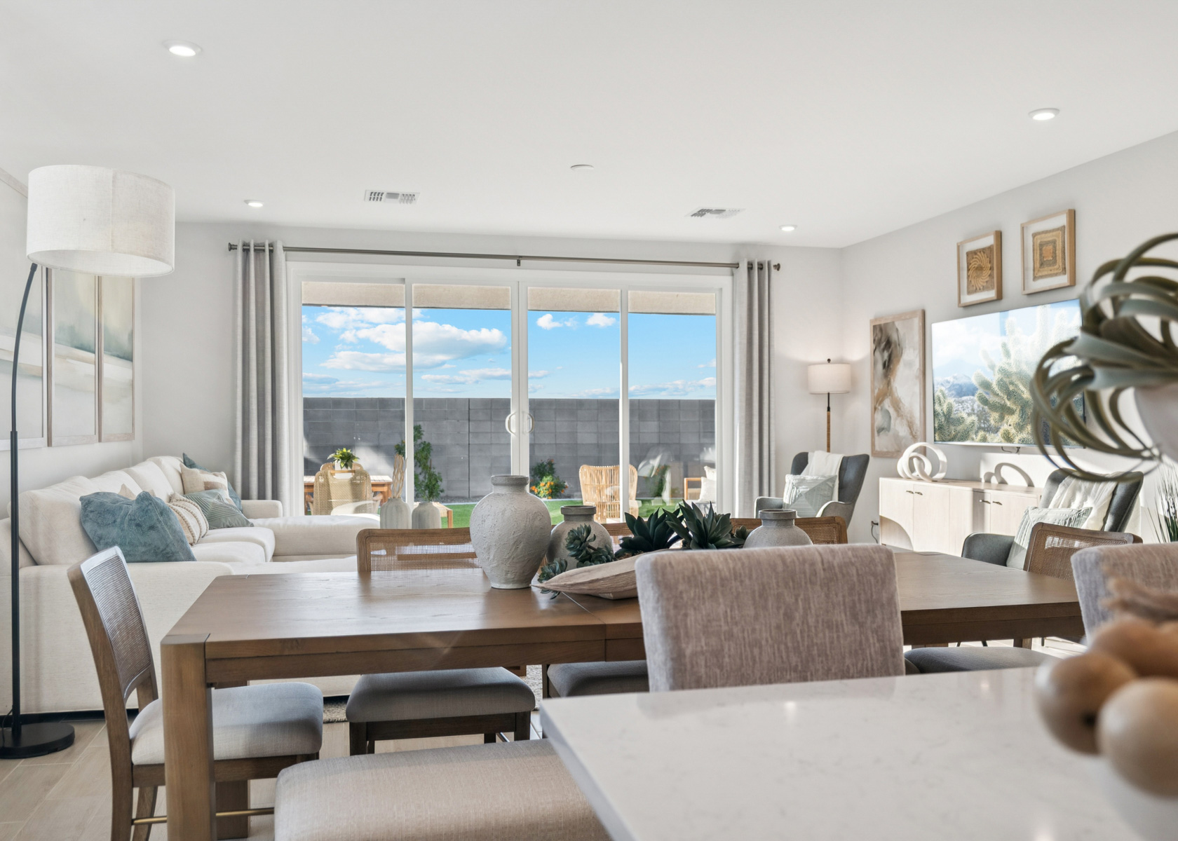 A room with a table and chairs.