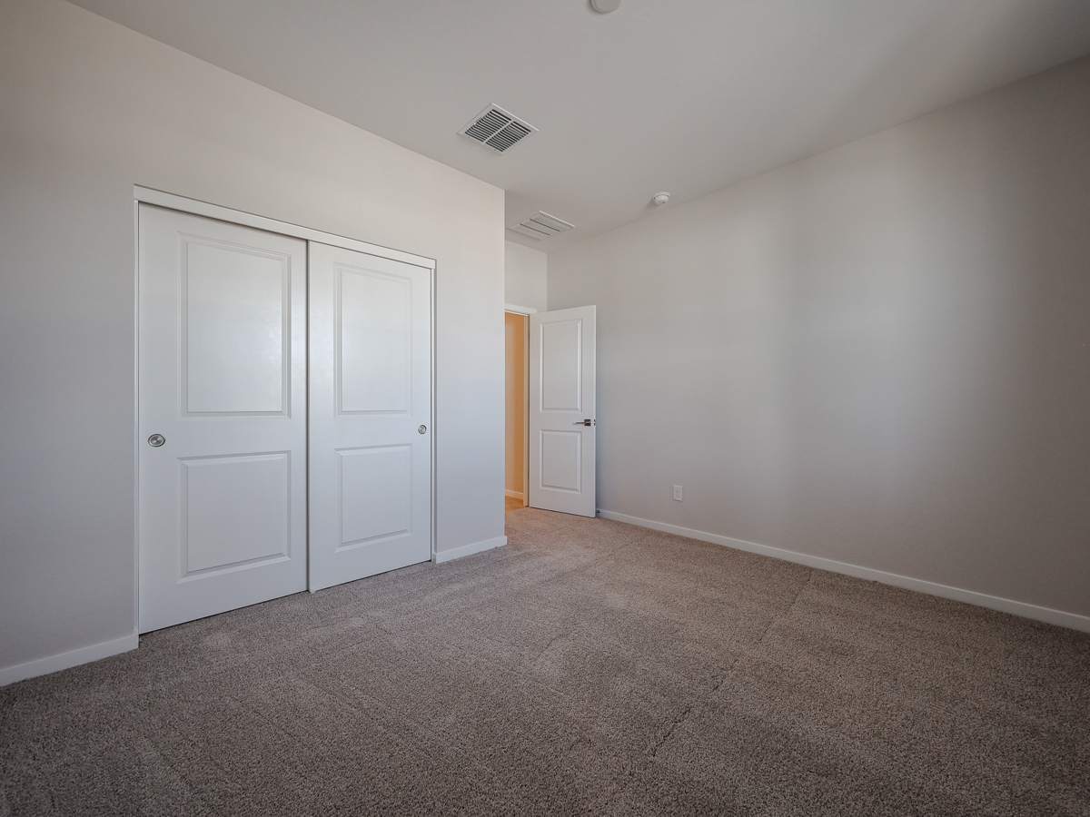 A room with white doors.