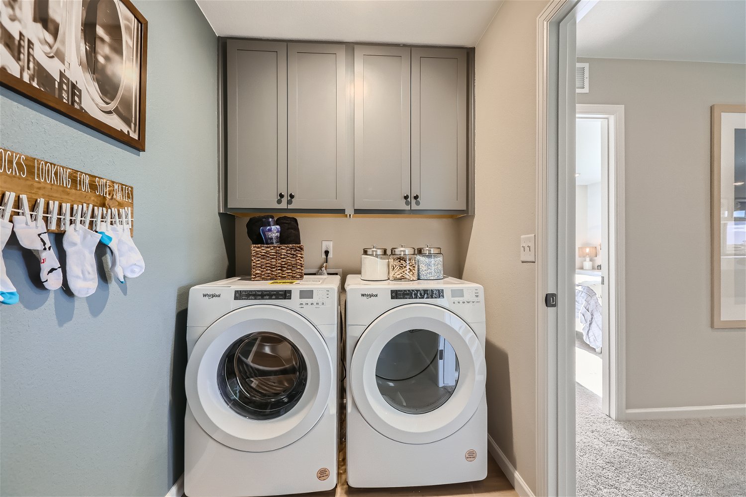 A laundry room with a washer and dryer.