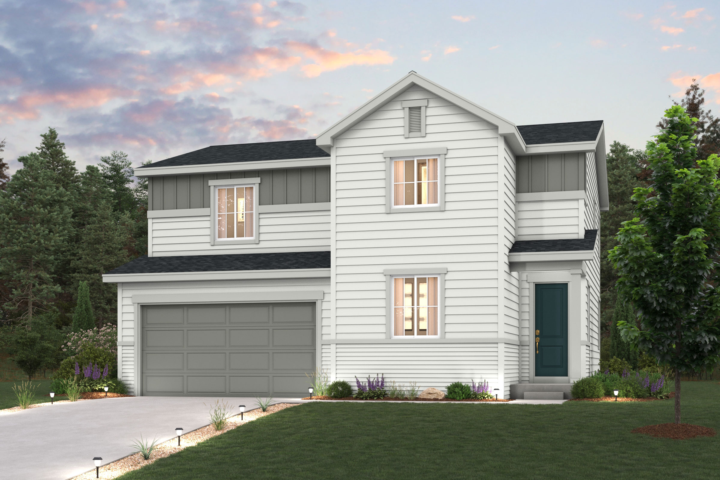 A white house with a garage.