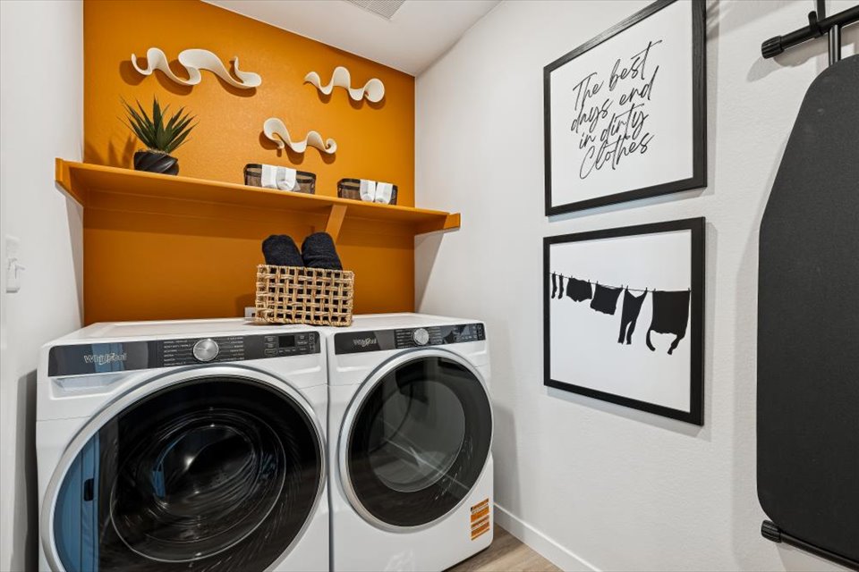 A laundry room with a dryer and dryer.
