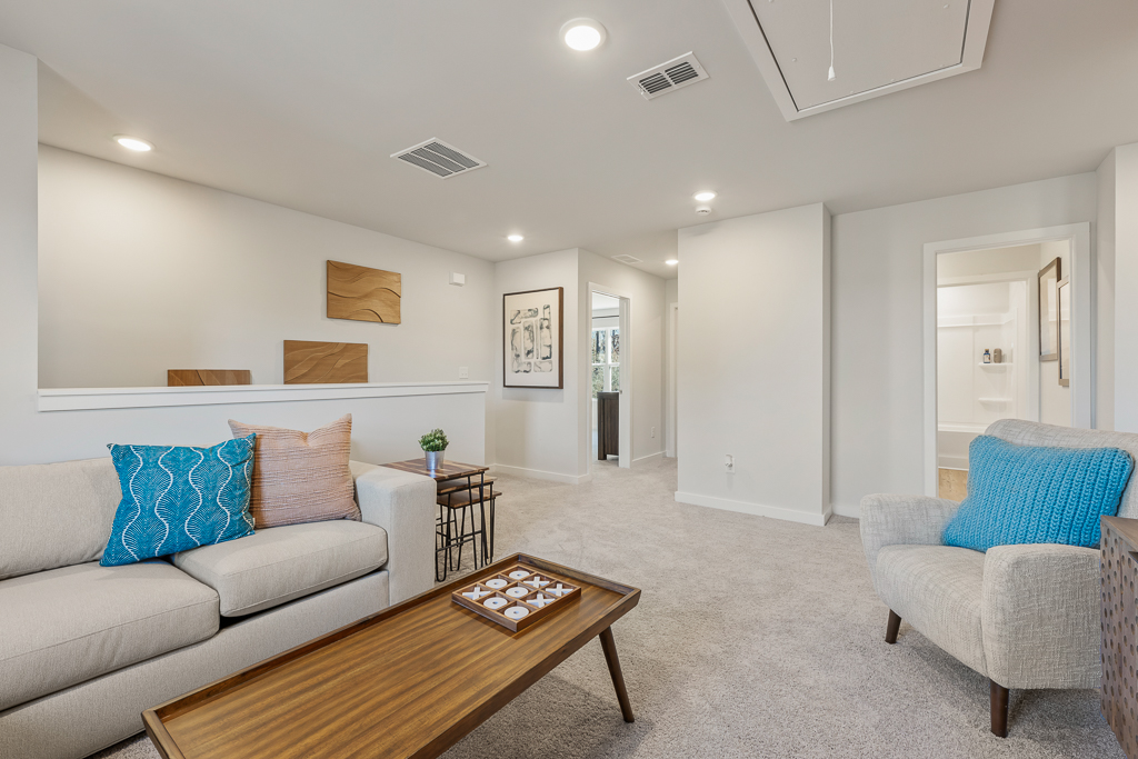 A living room with a couch and a coffee table.