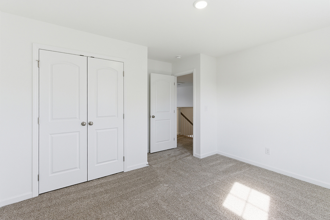 A room with white doors.