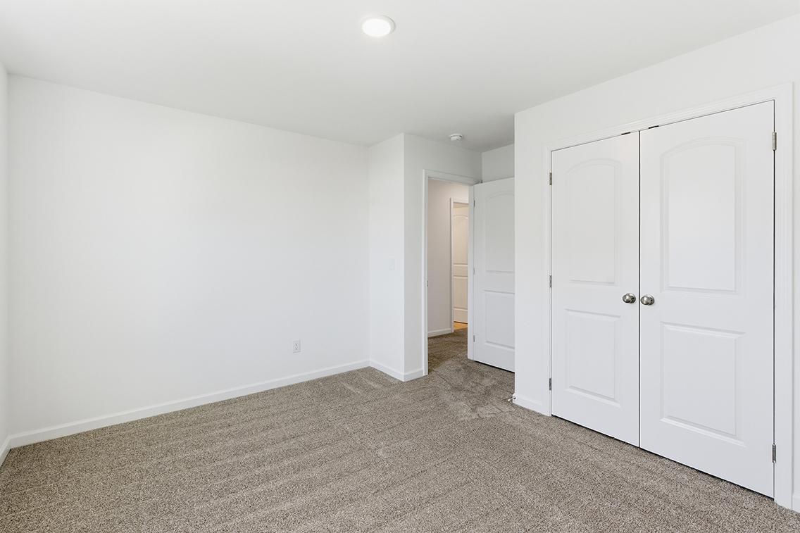 A room with white doors.