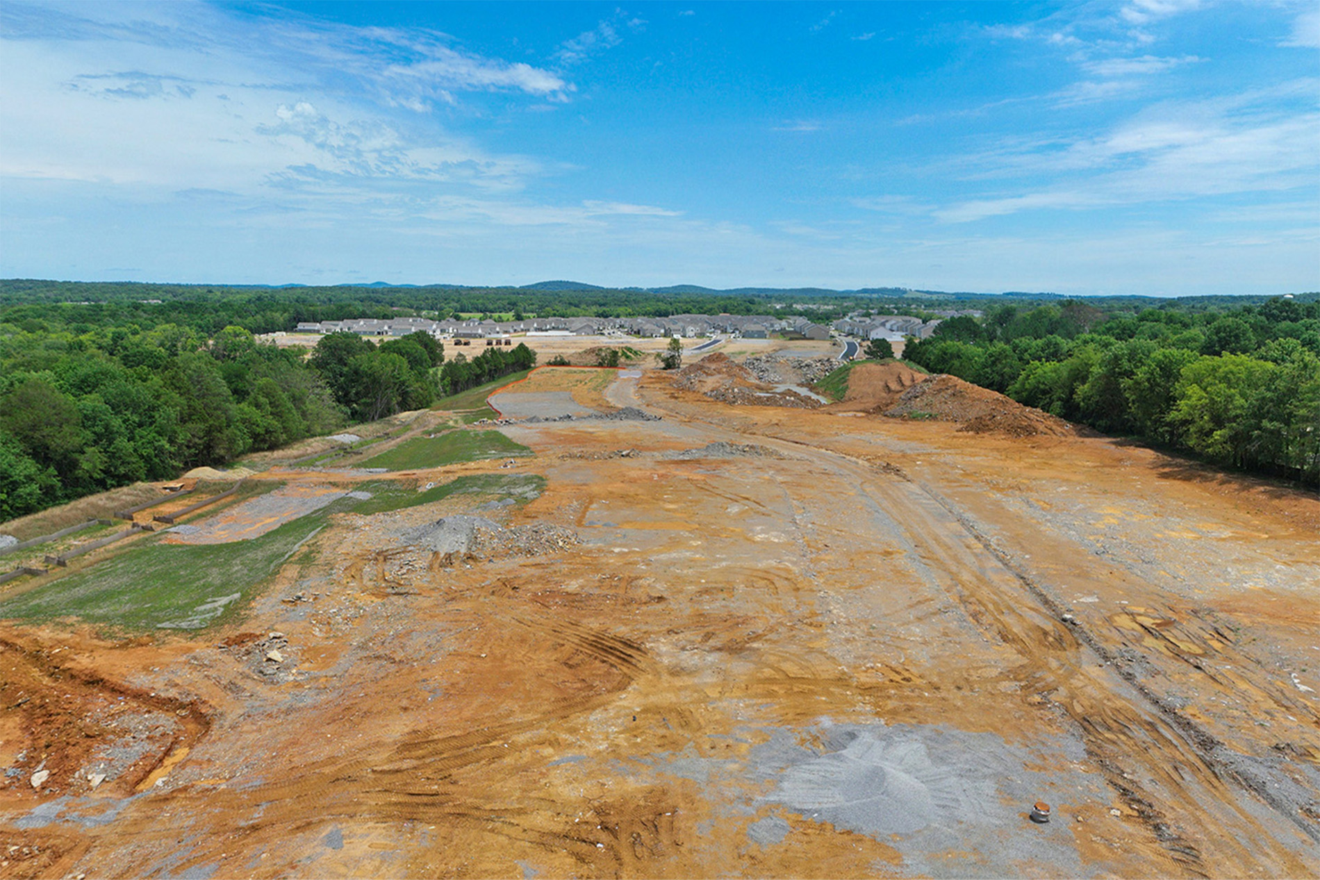 A large area of land with a river running through it.