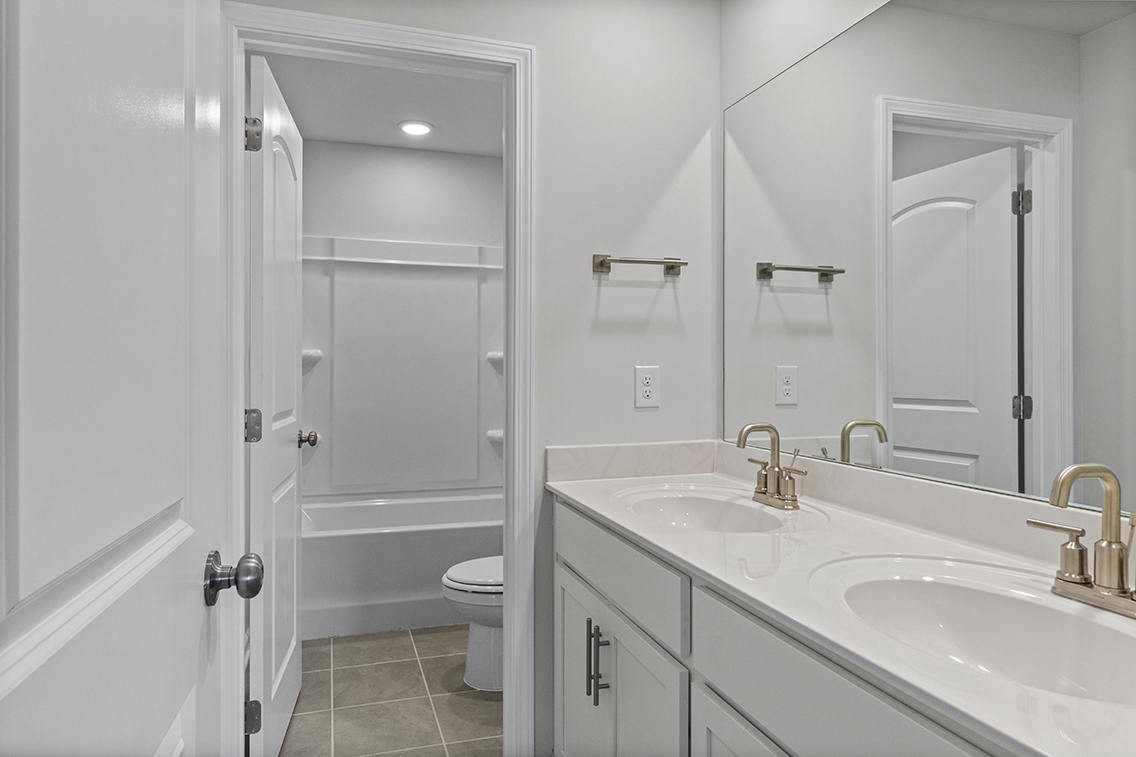 A bathroom with a glass shower.
