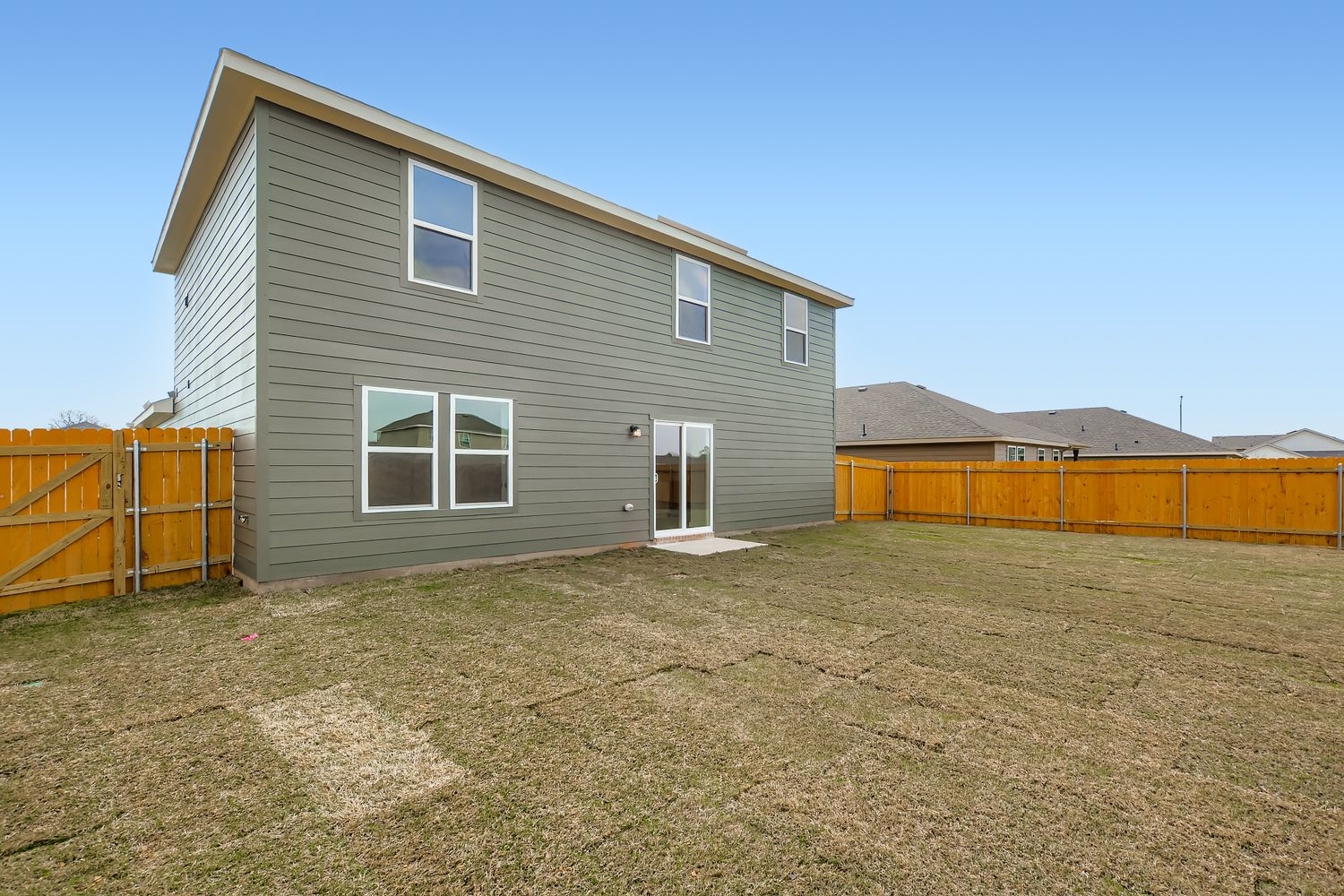 A house with a fence around it.