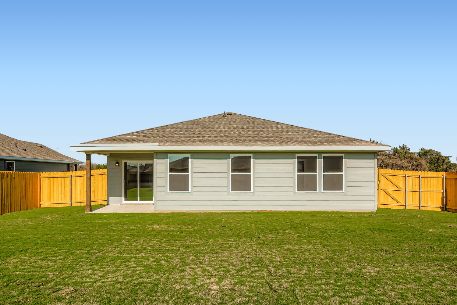 A house with a fence around it.