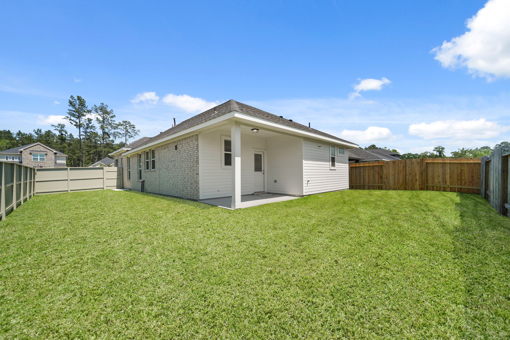 A house with a fence around it.