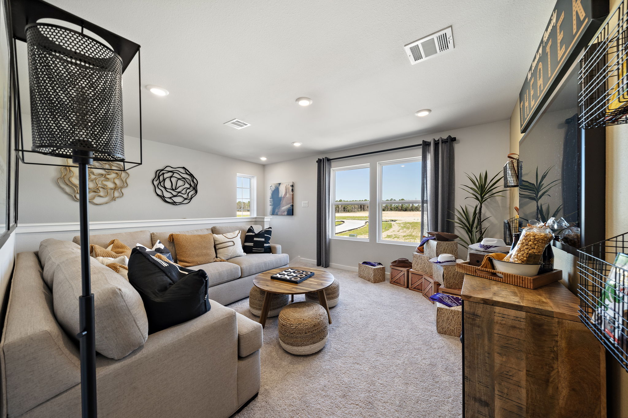 A living room with a large window.