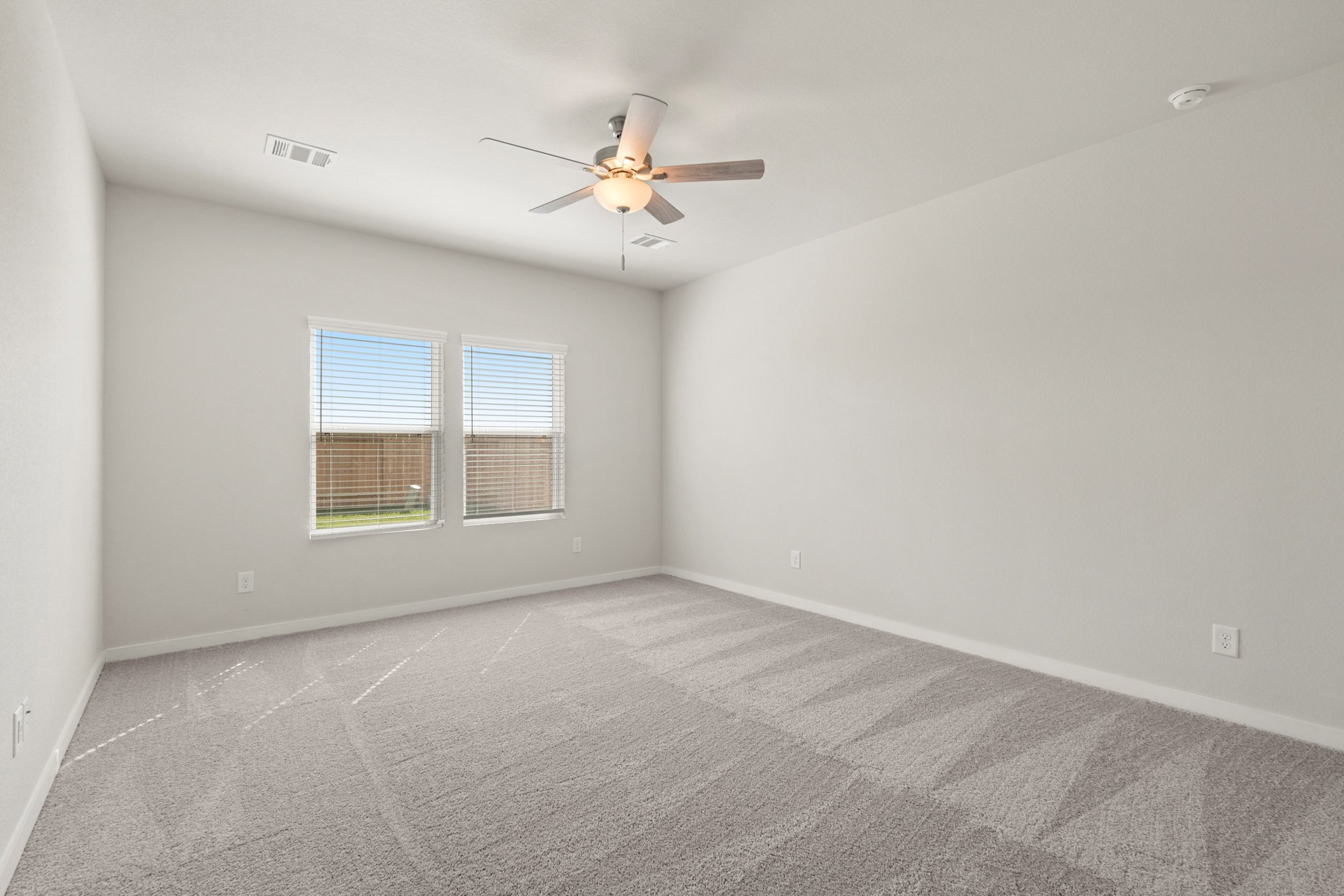 A ceiling fan in a room.