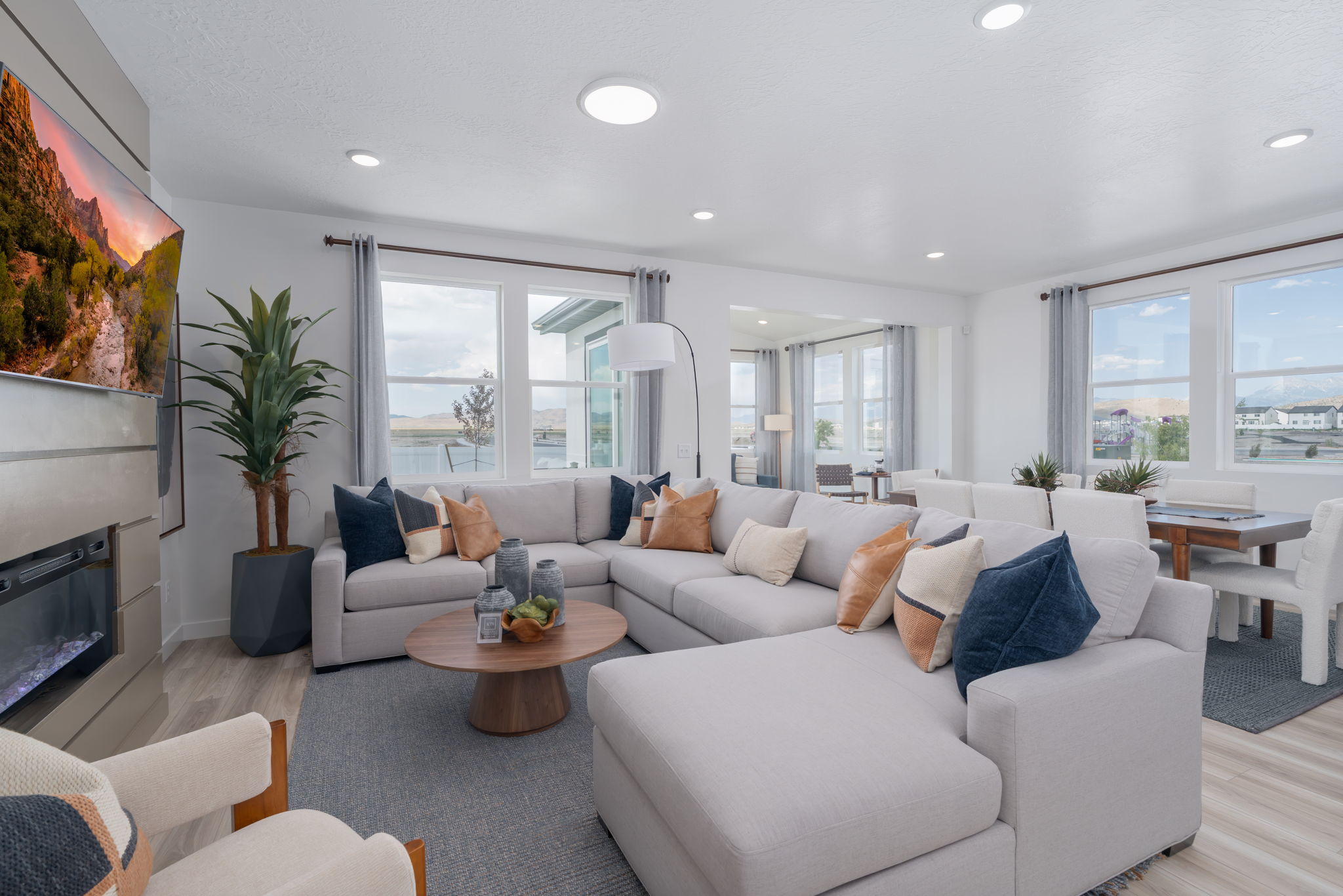 A living room with a large window.