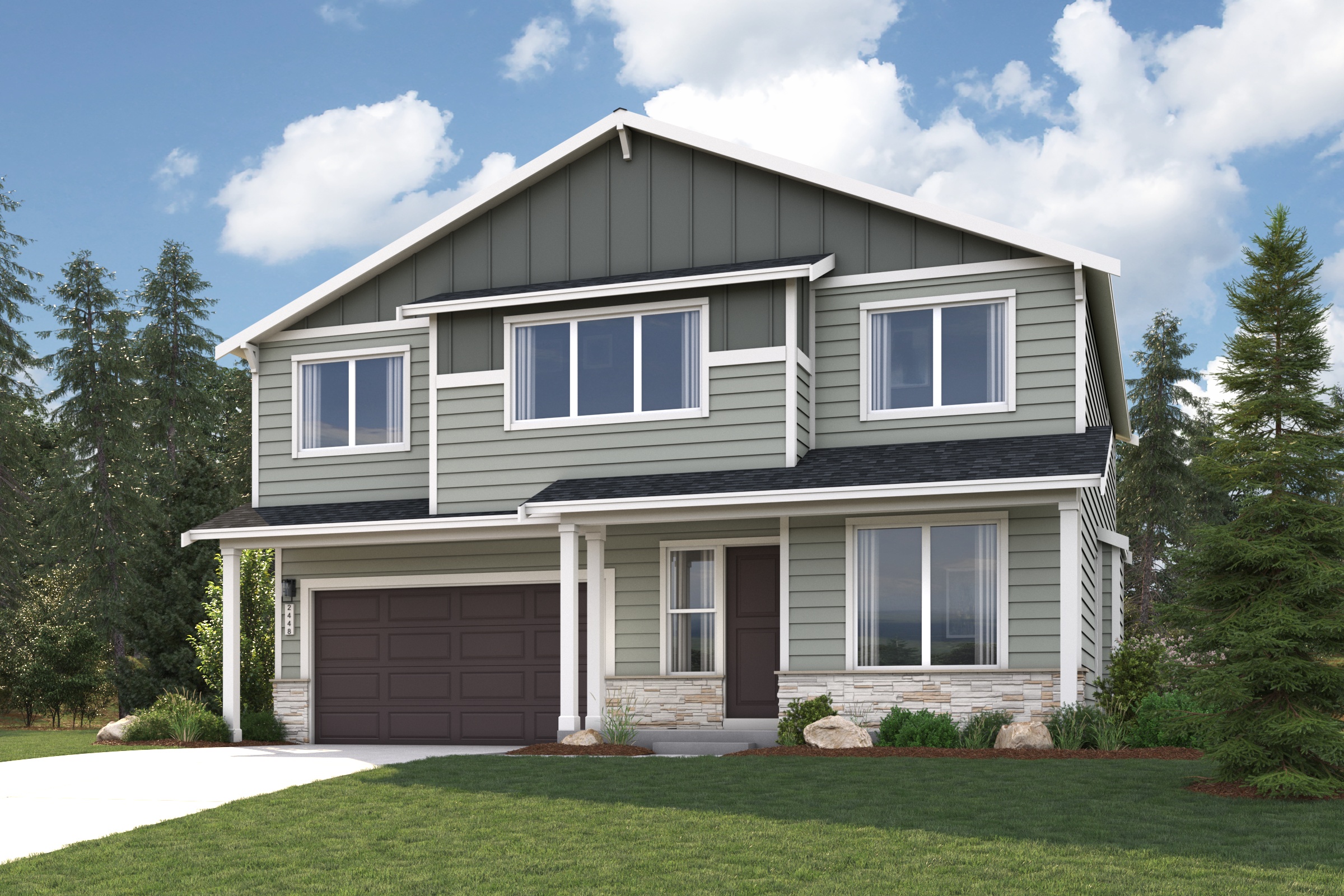 A house with a garage and trees.