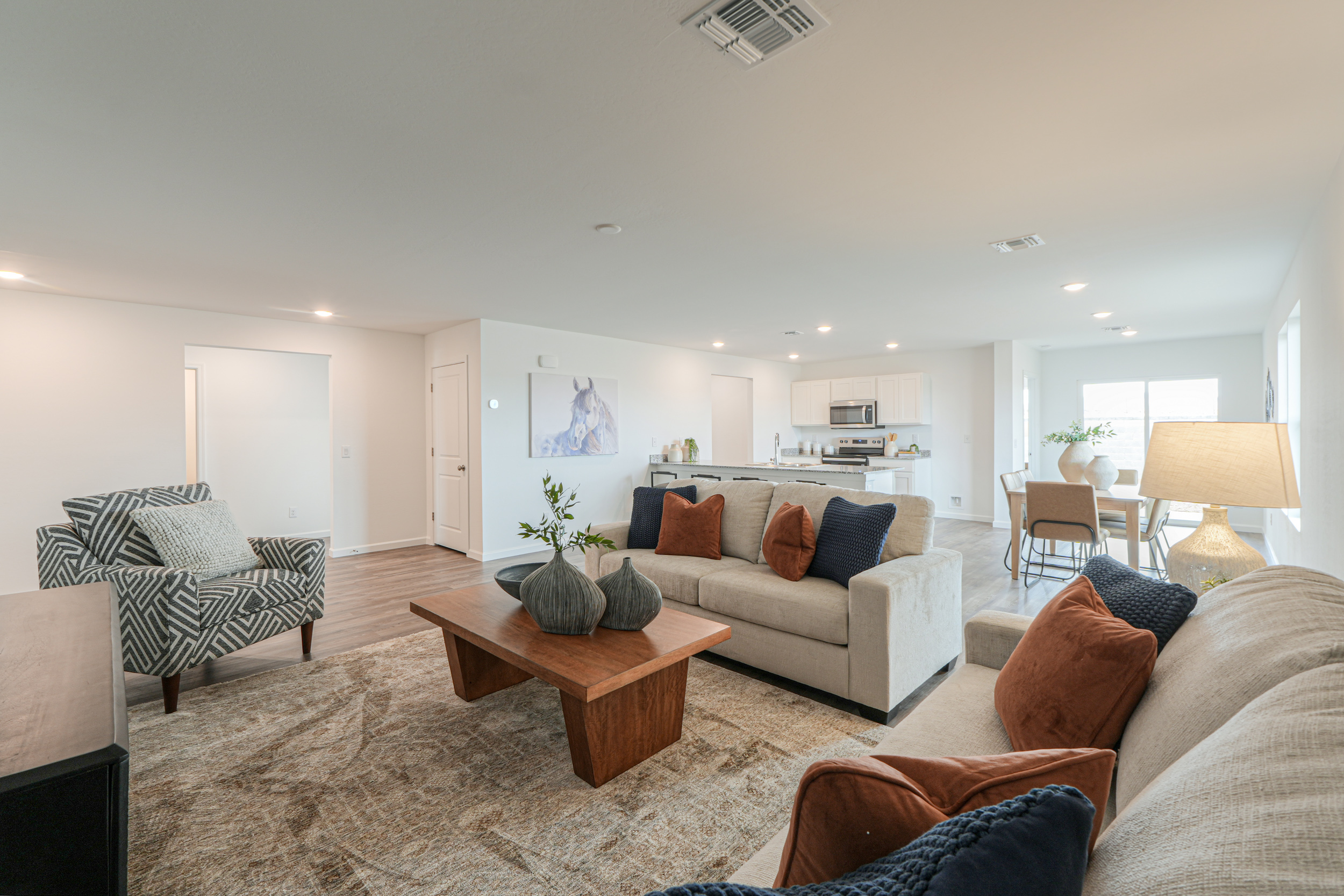 A living room with a couch and a coffee table.