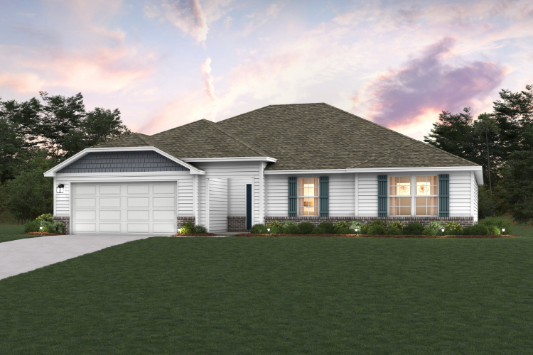 A house with a lawn in front of it.